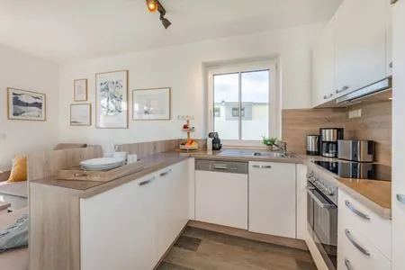 Küche / Küchenzeile Ferienhaus MeerSeenSucht mit Sauna, Terrasse und Grill