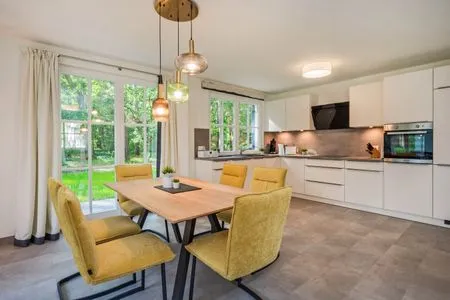 Küche / Küchenzeile Ferienhaus Im Kiefernwäldchen mit Sauna, Kamin und Terrasse
