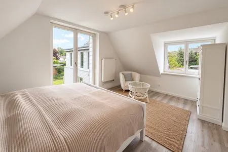Schlafzimmer Haffperle Küstenperle - zentral in Haffkrug, nur wenige Schritte zum Strand