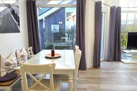 Wohnzimmer Ferienhaus "Rachel III" im Ferienpark Holm an der Ostsee