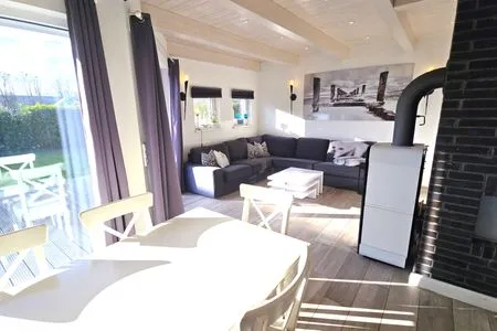 Wohnzimmer Ferienhaus "Marie II" ostseenah im Ferienpark Holm