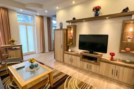 Wohnzimmer helle Ferienwohnung, strandnah mit großem Balkon