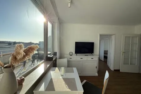 Wohnzimmer Ferienwohnung im Haus Strandstr.22 Hoja App. 63/ TG Platz Nr. 105  obere Ebene