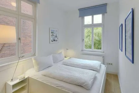 Schlafzimmer Logirhaus Doyen Ferienwohnung Robbenplate