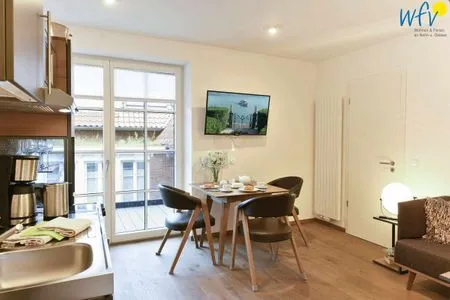 Wohnzimmer / Essbereich Haus Nordland Ferienwohnung Dünenblick