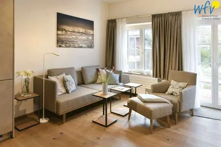 Wohnzimmer Haus Nordland Ferienwohnung Dünenkoje