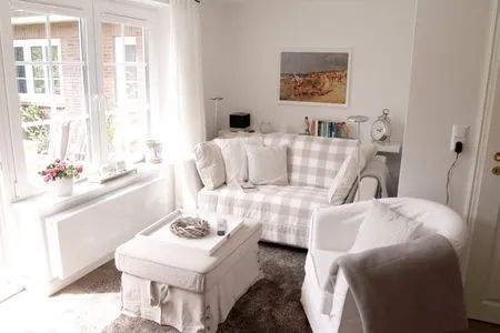 Wohnzimmer der Ferienwohnung Düne in Norddorf auf Amrum Haus Anneliese Bungalow Düne