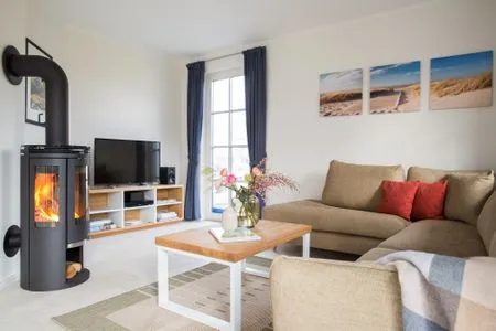 Wohnzimmer Ferienhaus Schilfrohrsänger 8