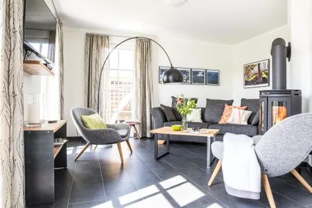 Wohnzimmer Ferienhaus Schilfrohrsänger 26