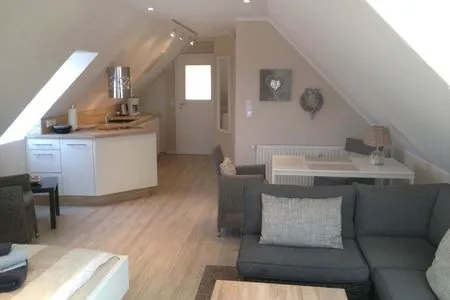 Wohnzimmer Ferienhaus Greune-Stee-Weg 39 Ferienwohnung Südstrandoase