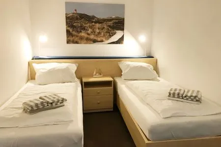 Schlafzimmer im Bungalow Frisia 1 in Norddorf auf Amrum Haus Frisia Bungalow Frisia 1