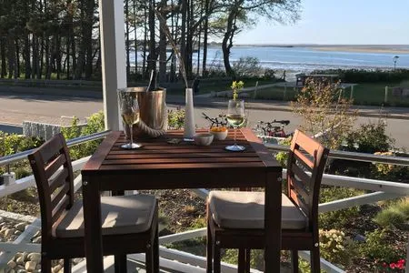Balkon mit Blick auf das Wattenmeer Haus *Weiße Düne* Ferienwohnung *Weiße Düne 3 / OceanView*