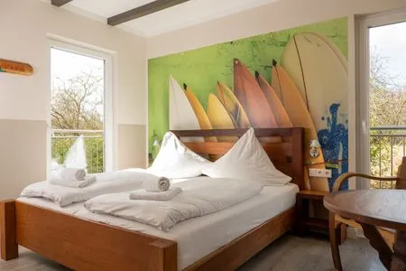 Schlafzimmer Typ D2 Ferienwohnung - Papa Bay