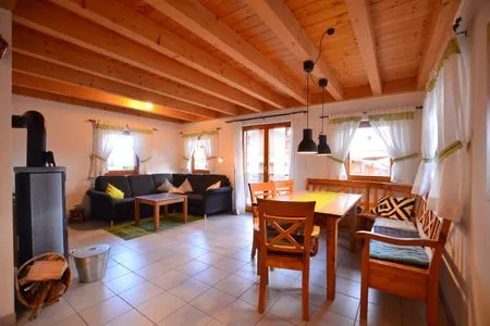 Wohnzimmer Bunte Kuh -  Feriendorf Via Claudia Haus 52