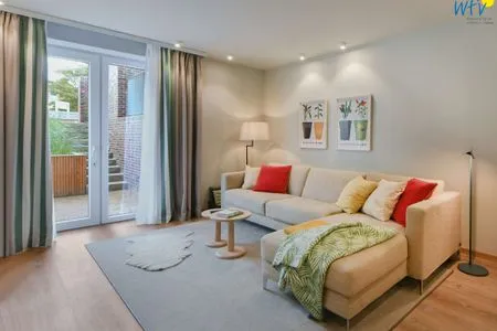 Wohnzimmer Töwerhus Ferienwohnungen Segel + Seestern