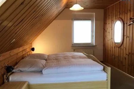 Schlafzimmer Haus Seemöwe Ferienwohnung Möwennest