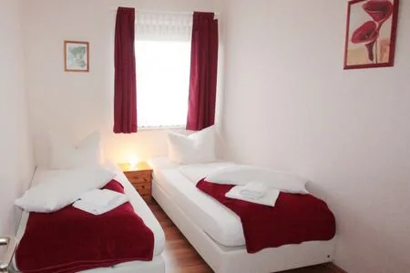 Schlafzimmer Haus am Kurpark Wohnung 12