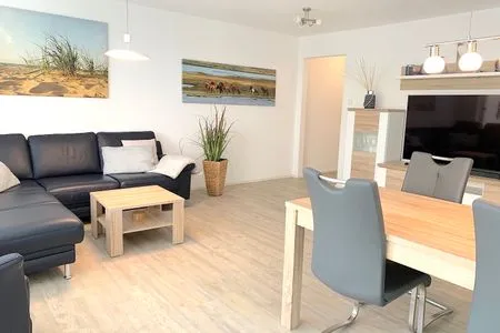 Wohnzimmer Ferienwohnung Freyja an der Hafenspitze: Komfort und Nähe zum Strand