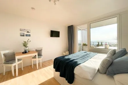 Wohnzimmer Moderne Ferienunterkunft mit Meerblick in Eckernförde 'KiekUt'
