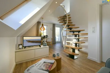 Wohnzimmer Haus am Dorfbrunnen Ferienwohnung Meer