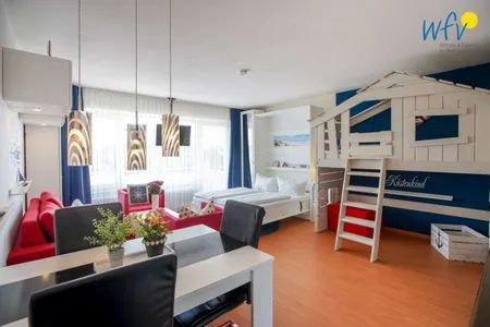 Wohnzimmer Holiday Residenz I Ferienwohnung Küstenkind