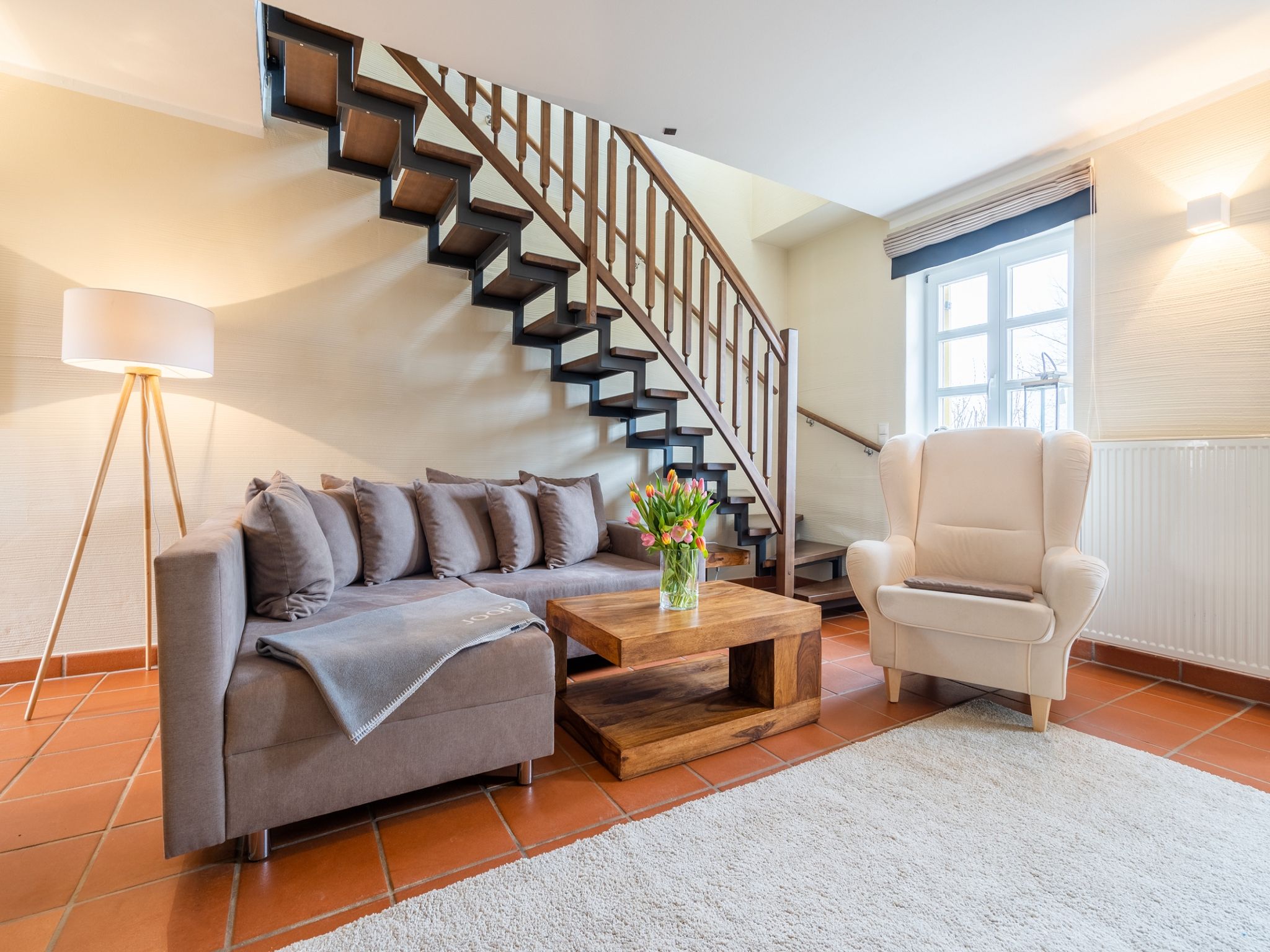 Feriendorf Rugana Komfortplus Ferienwohnung mit 2 Schlafzimmern und Terrasse (D11) Insel Rügen - Wohnzimmer