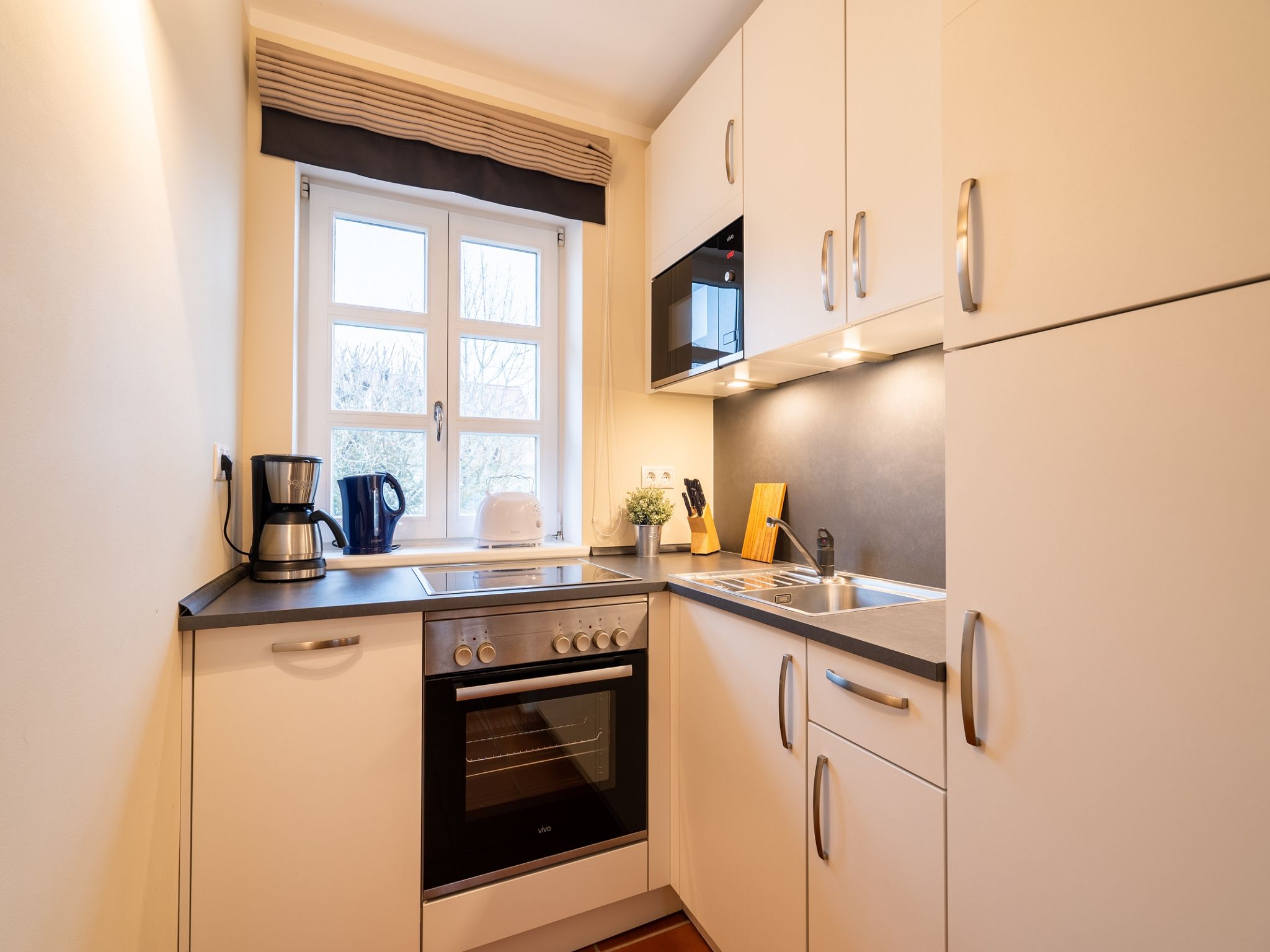 Feriendorf Rugana Komfortplus Ferienwohnung mit 2 Schlafzimmern und Terrasse (D33) Insel Rügen - Küche / Küchenzeile