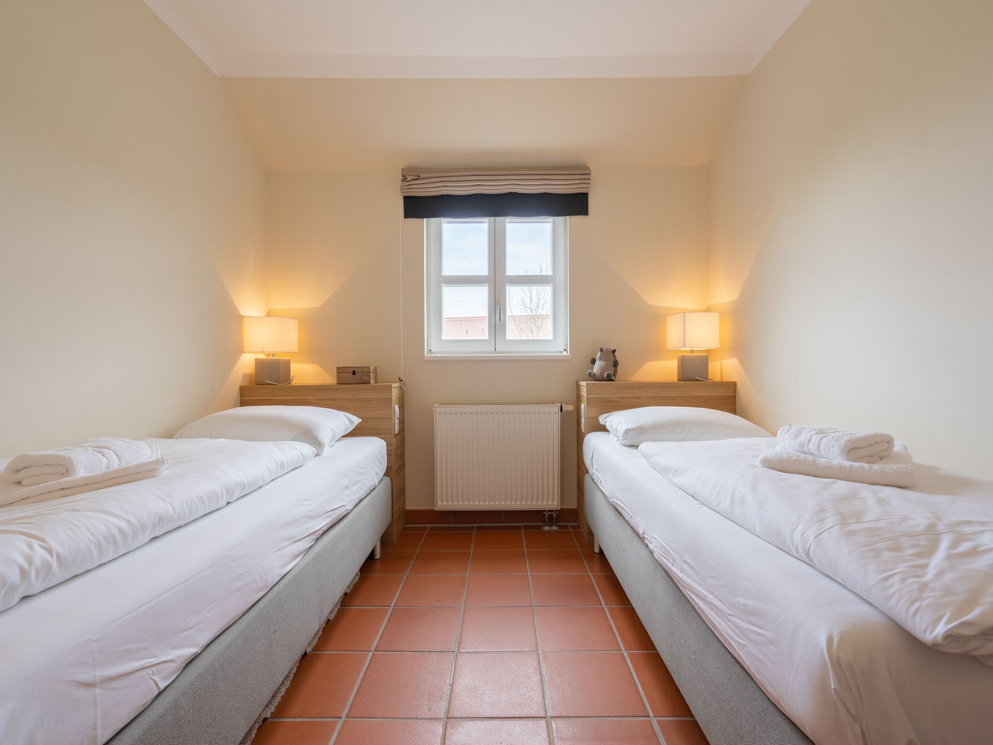 Feriendorf Rugana Komfortplus Ferienwohnung mit 2 Schlafzimmern und Terrasse (D51) Insel Rügen - Schlafzimmer