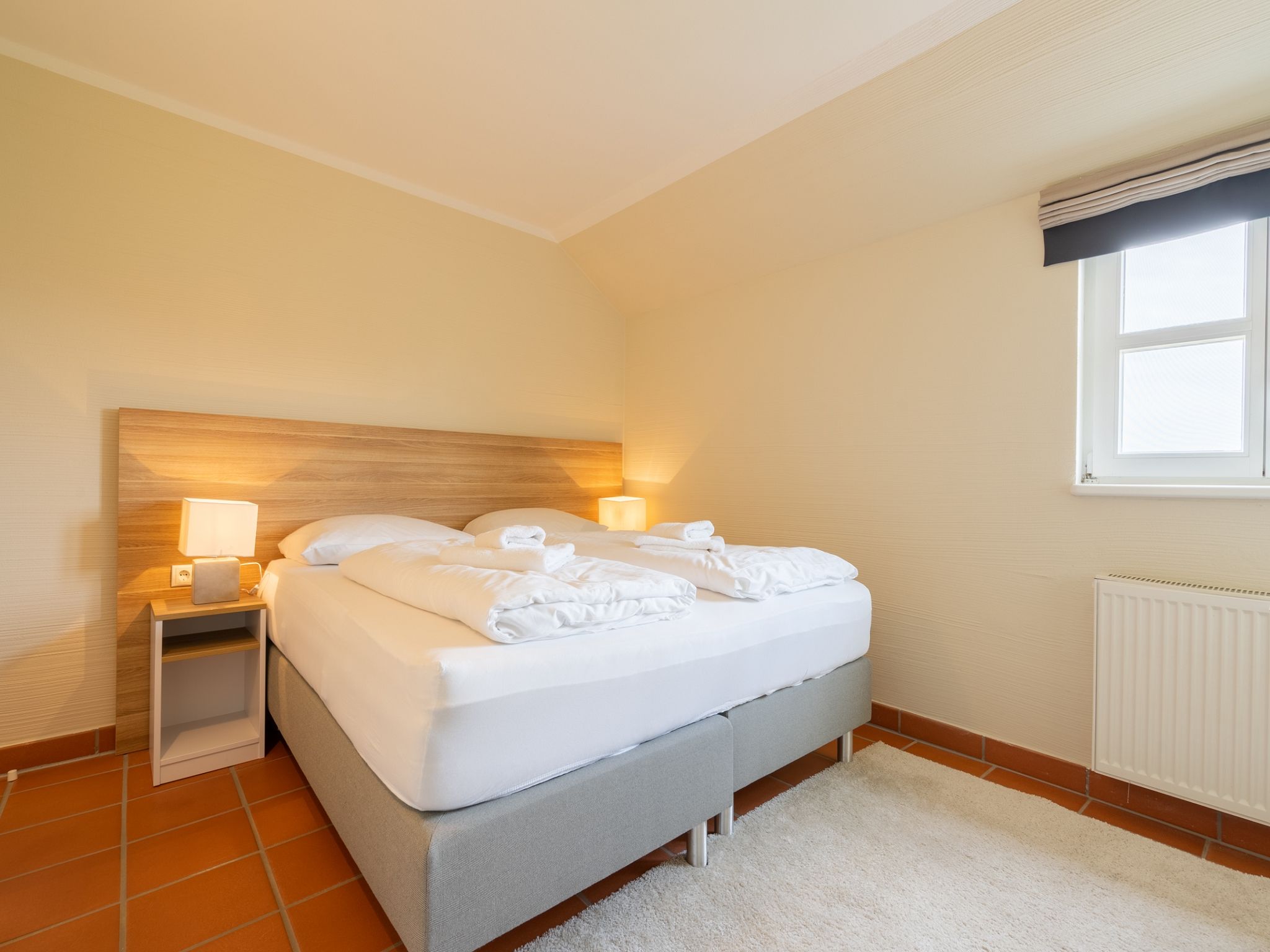 Feriendorf Rugana Komfortplus Ferienwohnung mit 2 Schlafzimmern und Terrasse (D52) Insel Rügen - Schlafzimmer