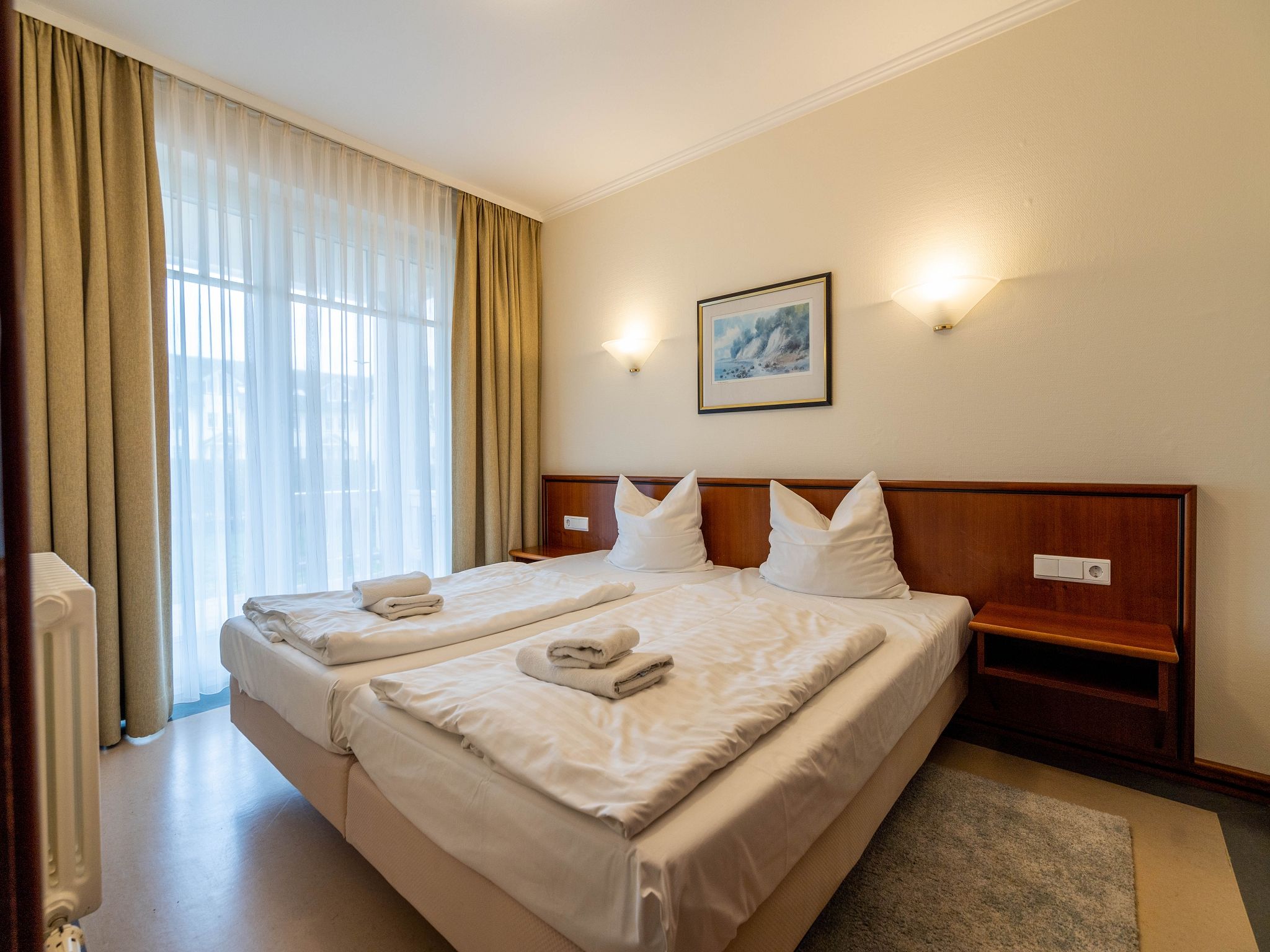 Dünenpark Binz Komfort Ferienwohnung mit 1 Schlafzimmer und Terrasse im Erdgeschoss (026) Insel Rügen - Schlafzimmer