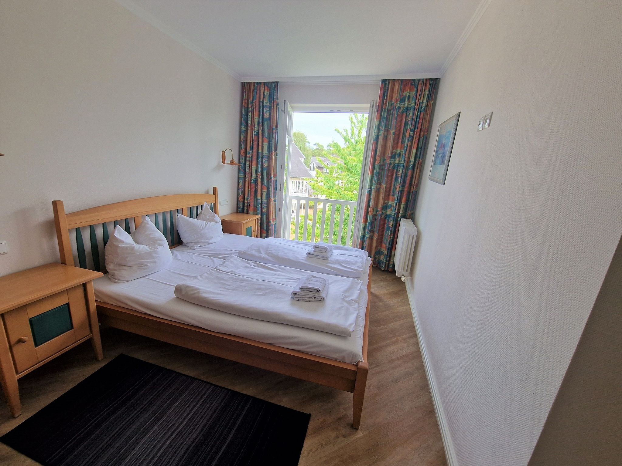 Dünenpark Binz Komfort Ferienwohnung mit 1 Schlafzimmer und Balkon im Dachgeschoss (172) Insel Rügen - Schlafzimmer