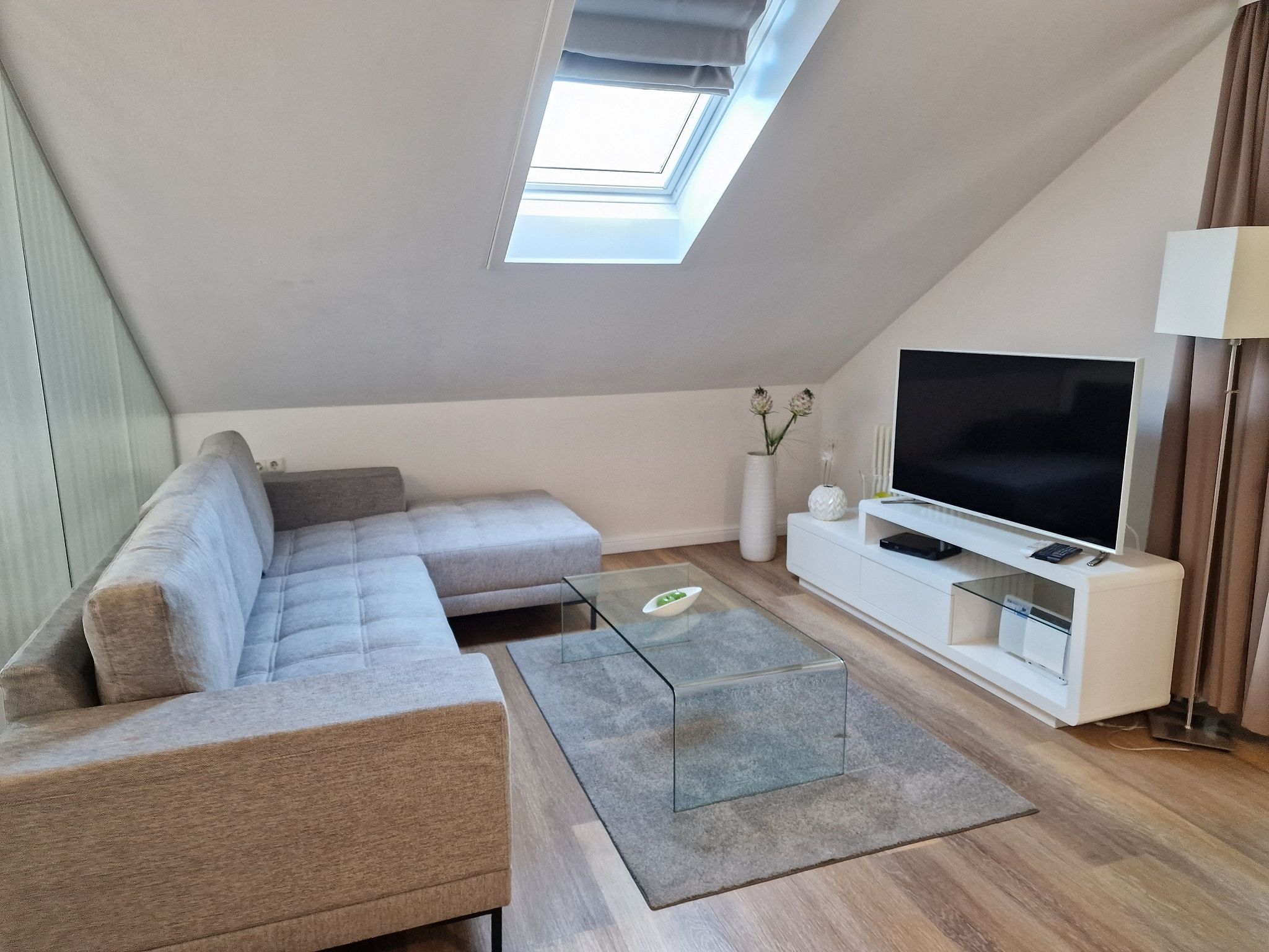 Dünenpark Binz Komfortplus 1-Raum-Ferienwohnung mit Balkon im Dachgeschoss (095) Insel Rügen - Wohnzimmer