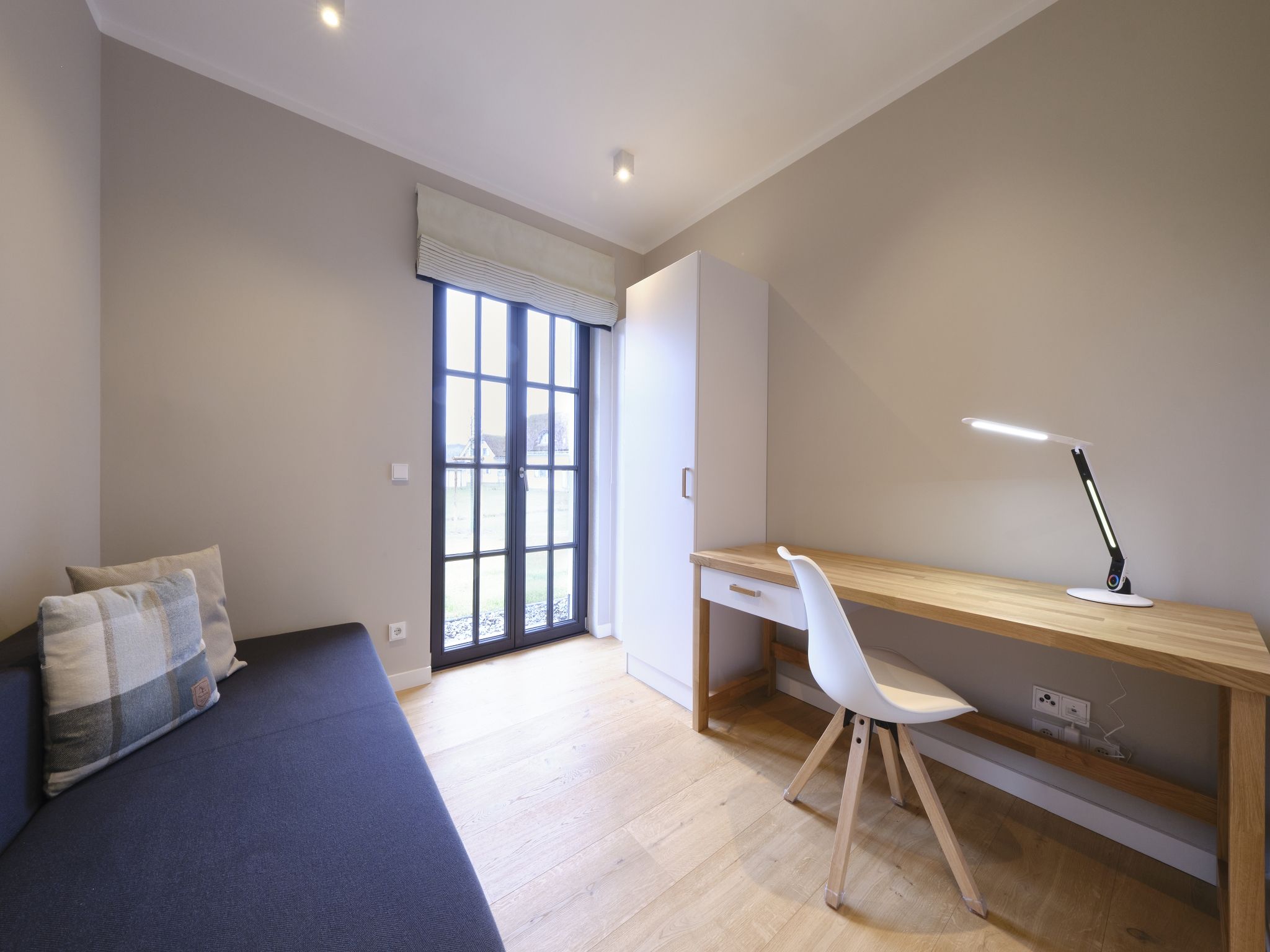 Luxus Reetdachvilla mit 3 Schlafzimmern, Sauna und Kamin (G05) - Wohnzimmer