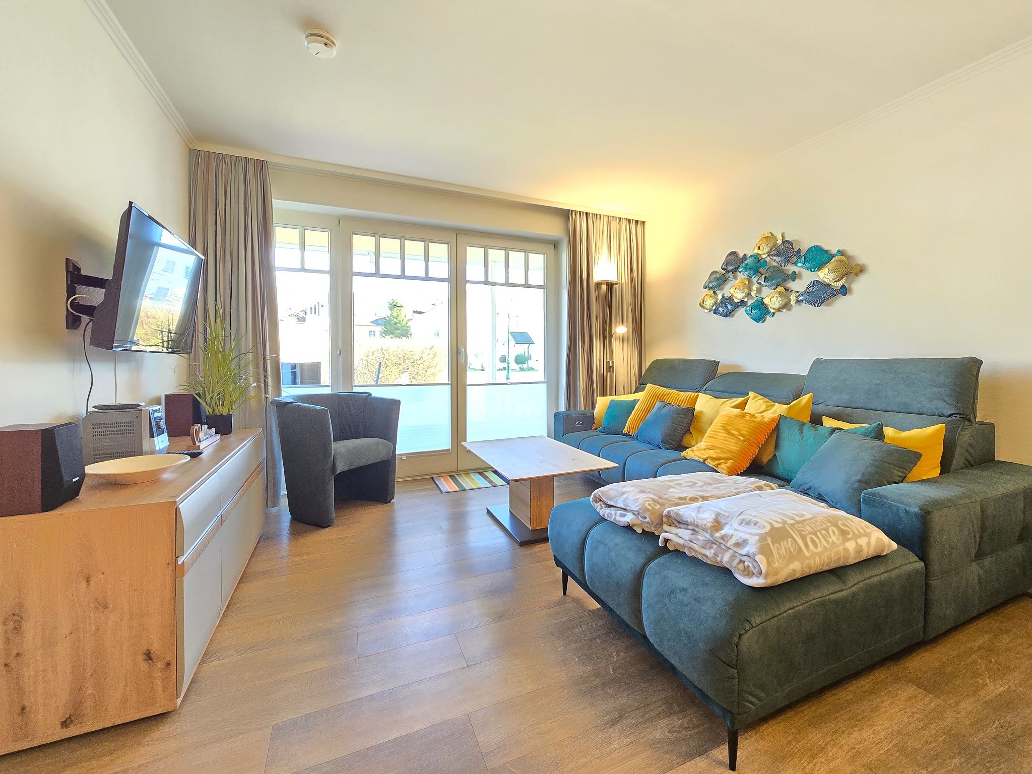 Dünenpark Binz Komfortplus Ferienwohnung mit 2 Schlafzimmern und Terrasse im Erdgeschoss (166) Insel Rügen - Wohnzimmer