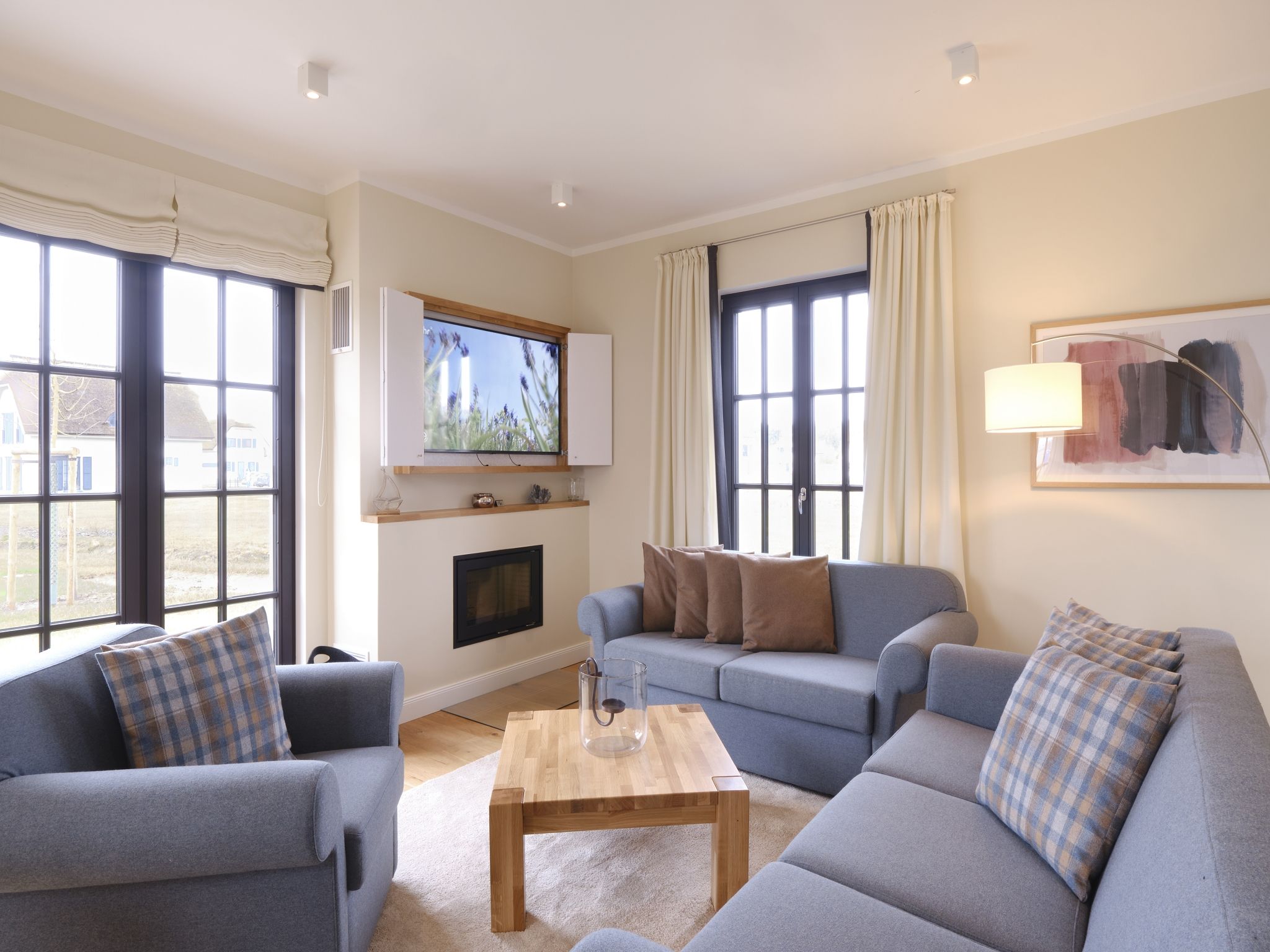 Luxus Reetdachvilla mit 3 Schlafzimmern, Sauna und Kamin (G06) - Wohnzimmer