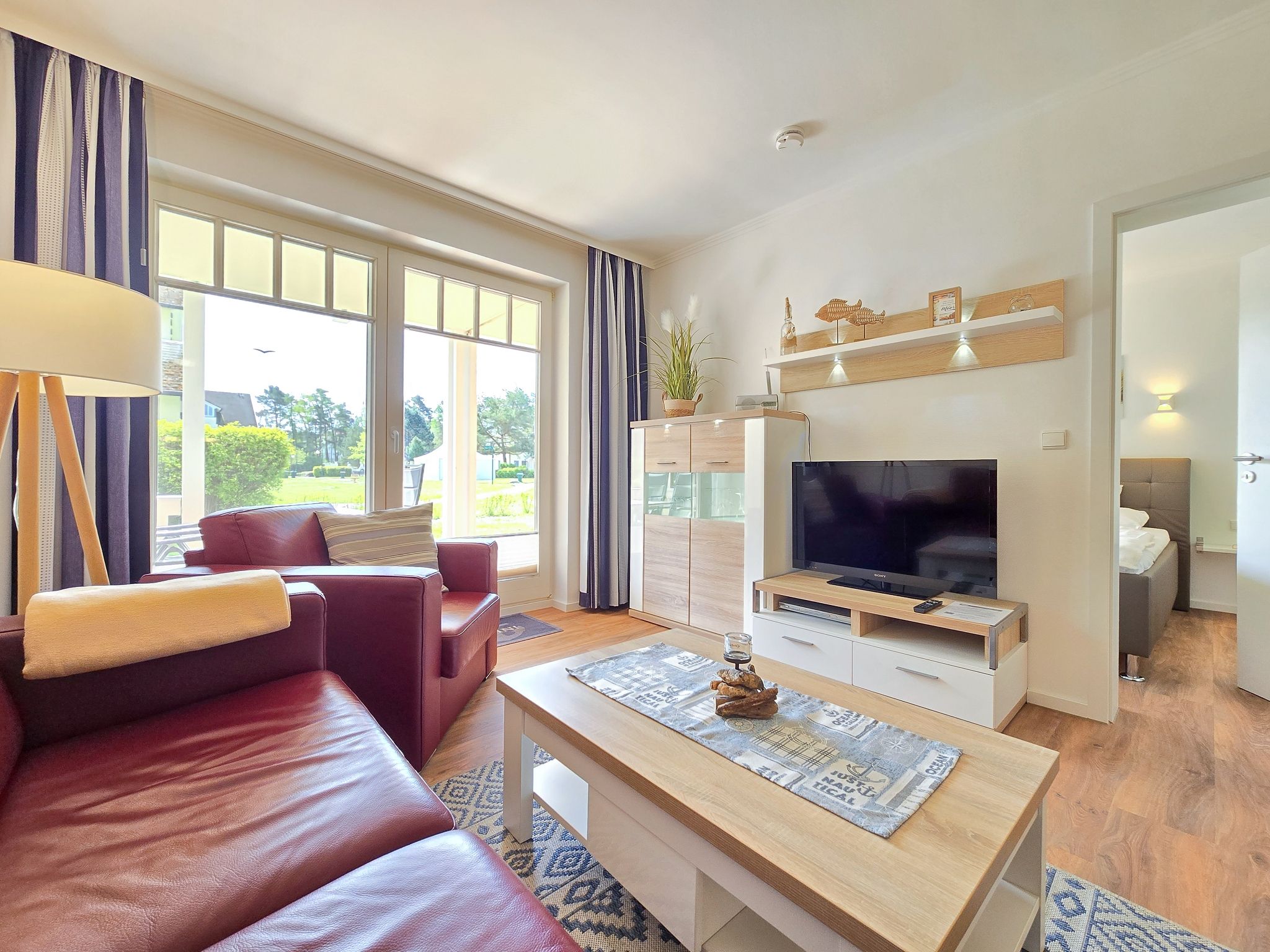 Dünenpark Binz Komfortplus Ferienwohnung mit 1 Schlafzimmer und Terrasse im Erdgeschoss (212) Insel Rügen - Wohnzimmer