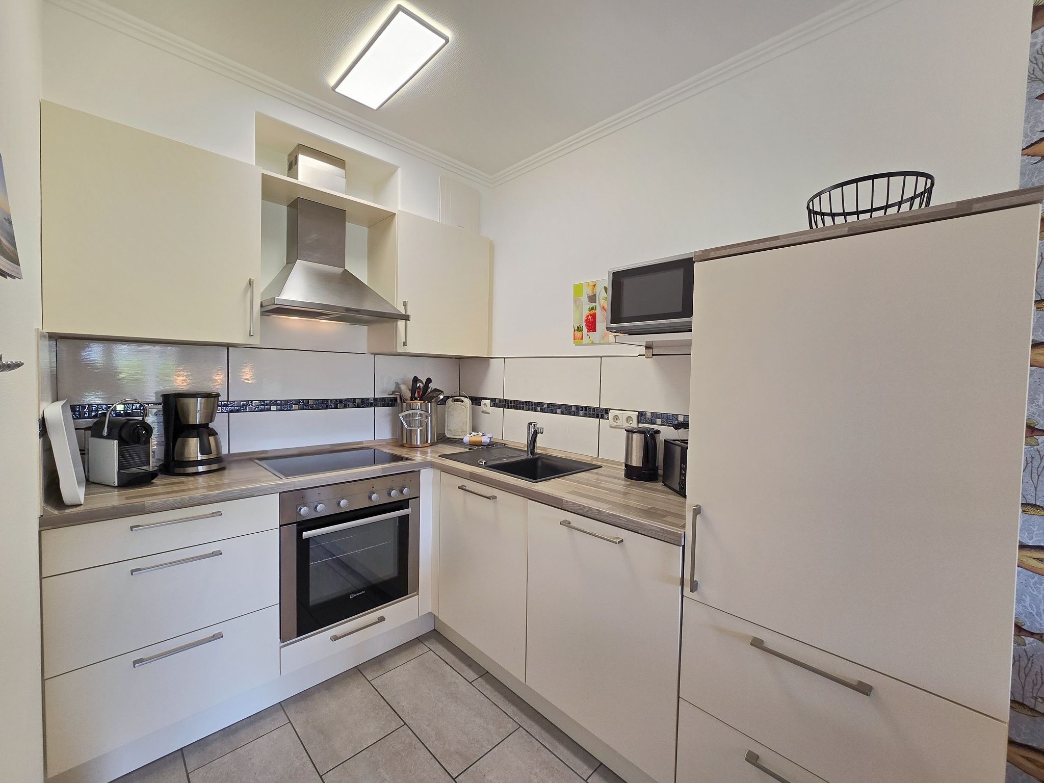 Dünenpark Binz Komfortplus Ferienwohnung mit 1 Schlafzimmer und Terrasse im Erdgeschoss (212) Insel Rügen - Küche / Küchenzeile