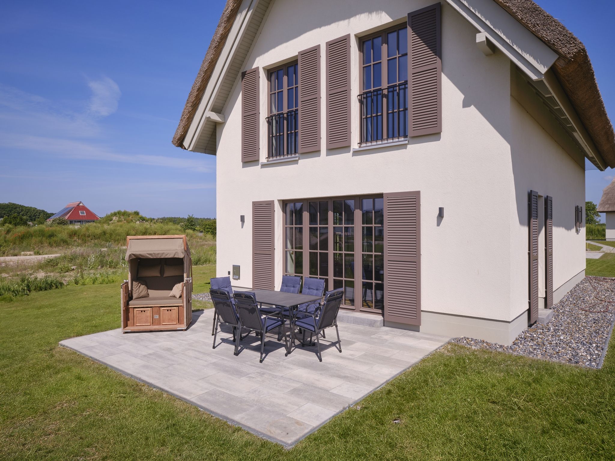 Luxus Reetdachvilla mit 3 Schlafzimmern, Sauna und Kamin (H18) - Terrasse