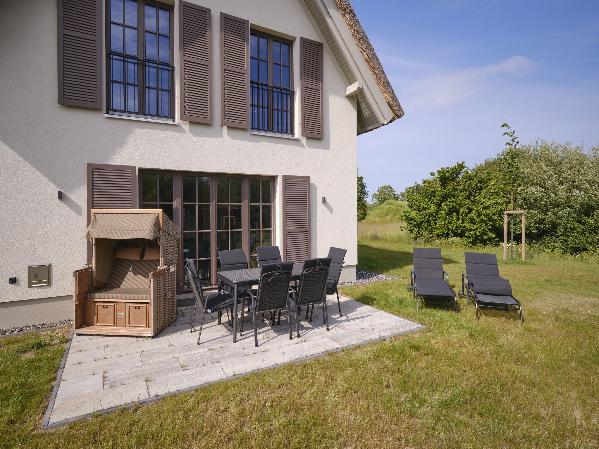 Luxus Reetdachvilla mit 3 Schlafzimmern, Sauna und Kamin (H07) - Terrasse