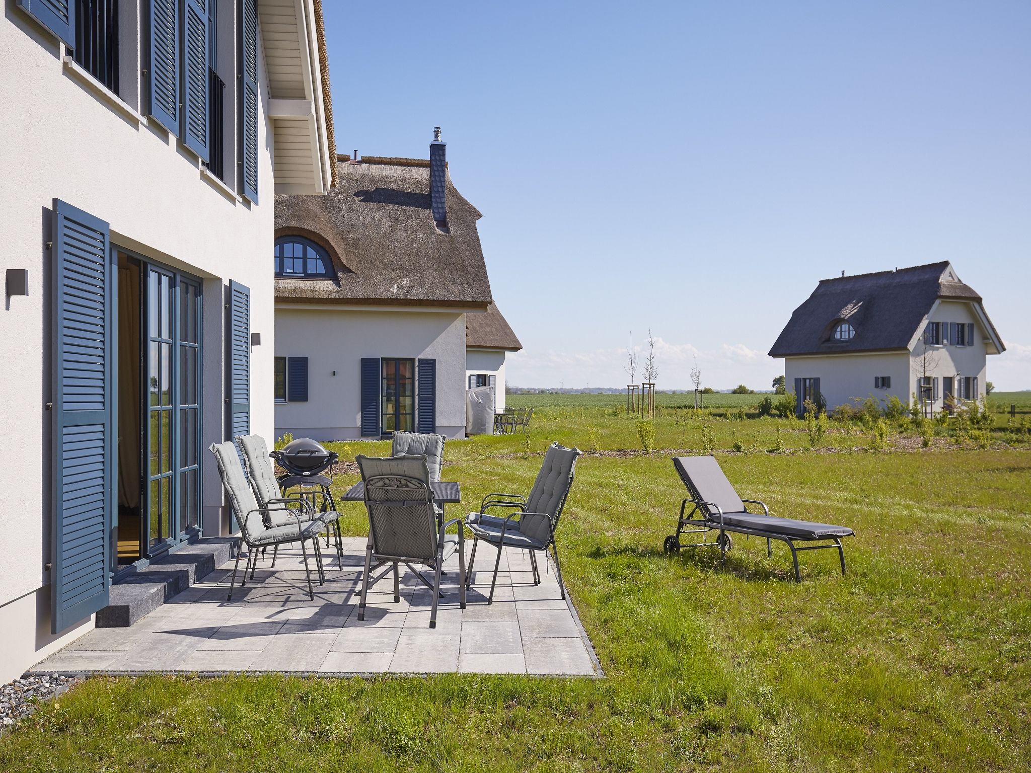 Luxus Reetdachvilla mit 3 Schlafzimmern, Sauna und Kamin (F08) - Terrasse