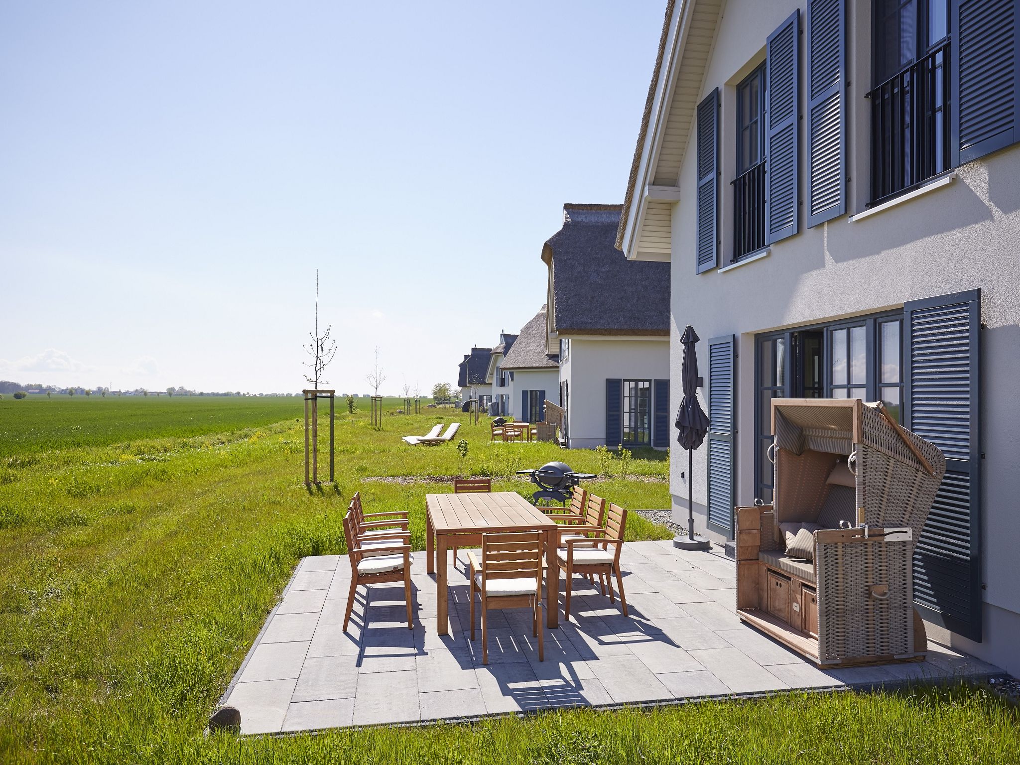 Luxus Reetdachvilla mit 3 Schlafzimmern, Sauna und Kamin (F12) - Terrasse