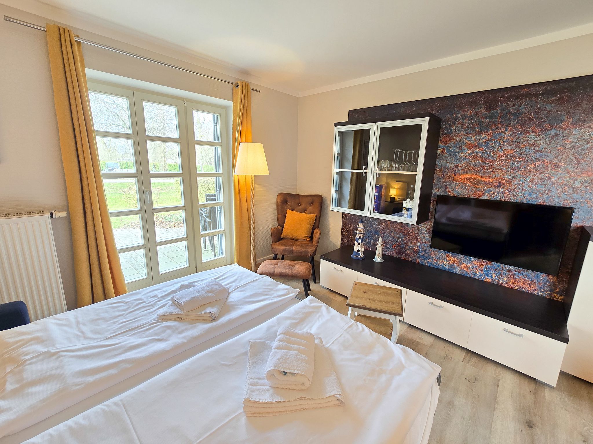 Feriendorf Rugana Komfortplus 1-Raum Ferienwohnung mit Terrasse (C47) Insel Rügen - Wohnzimmer