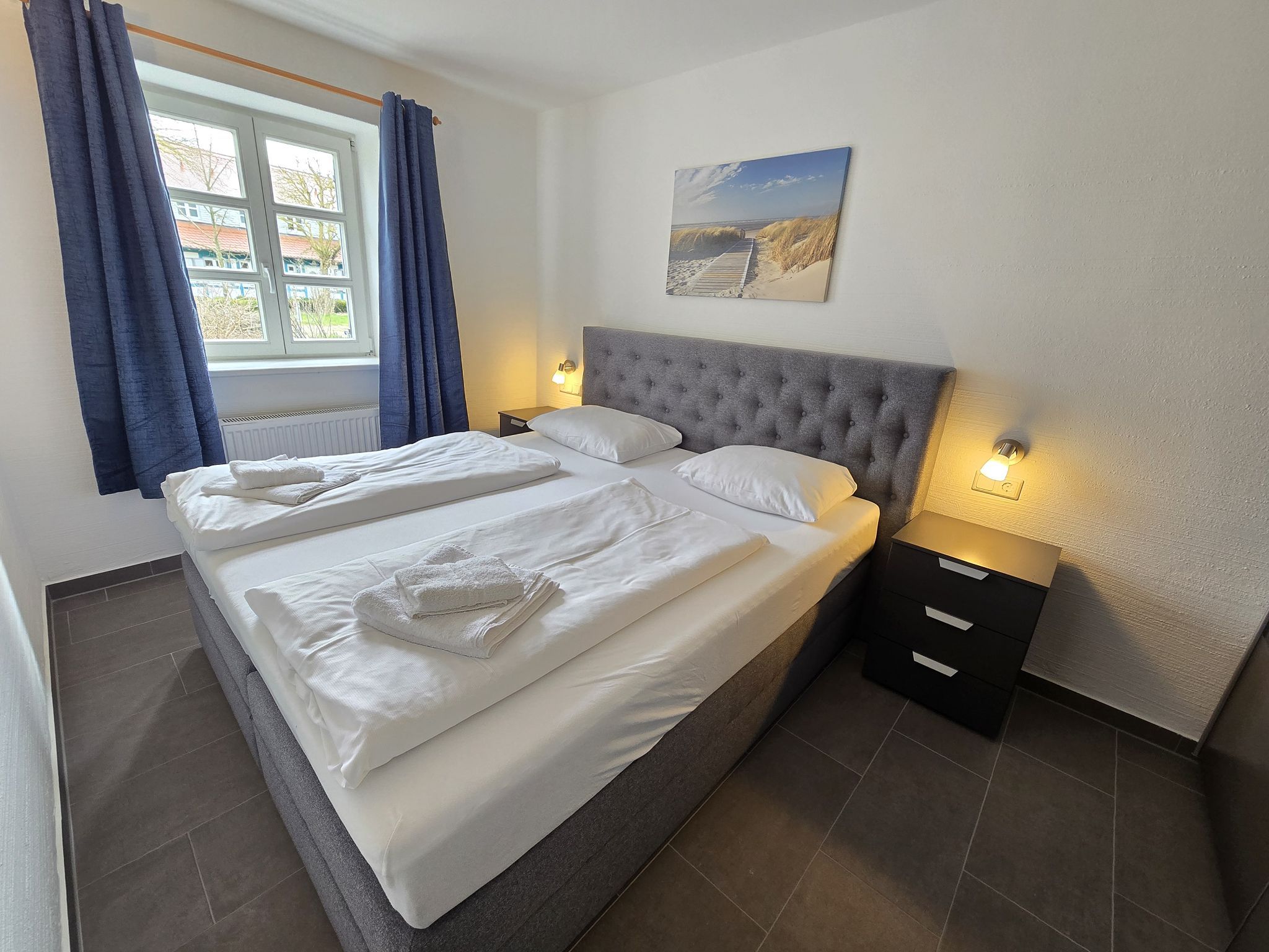 Feriendorf Rugana Komfort Ferienwohnung mit 1 Schlafzimmern und Terrasse (C42) Insel Rügen - Schlafzimmer