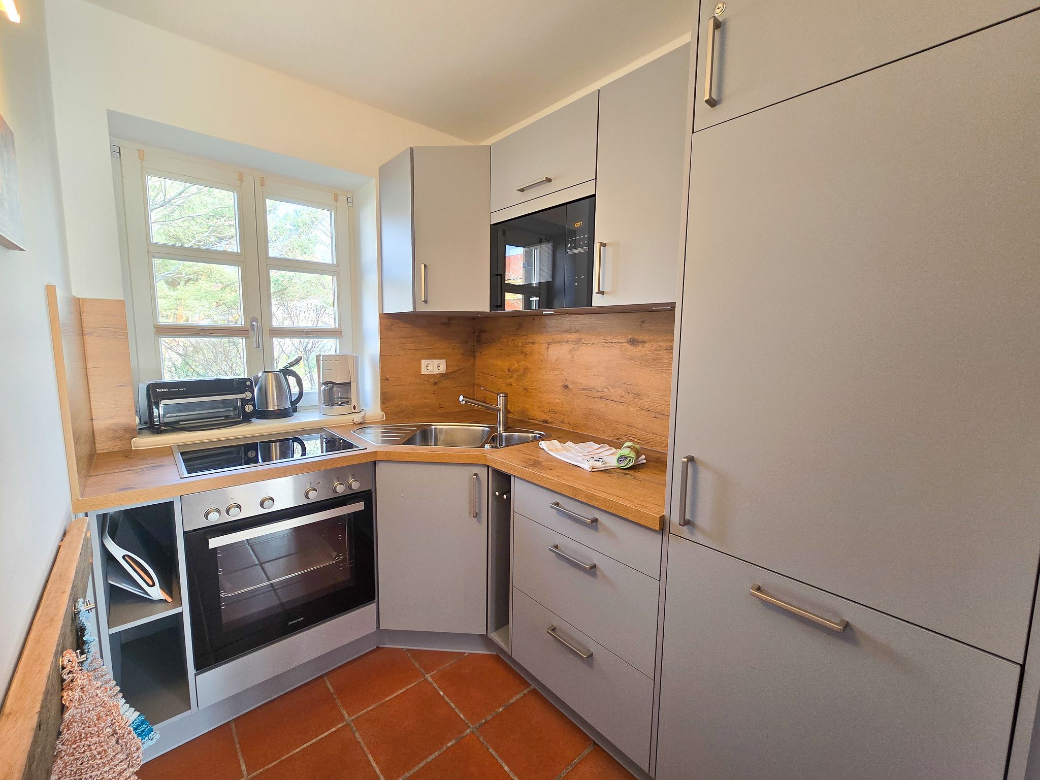 Feriendorf Rugana Komfortplus Ferienwohnung mit 2 Schlafzimmern und Terrasse (A06) Insel Rügen - Küche / Küchenzeile