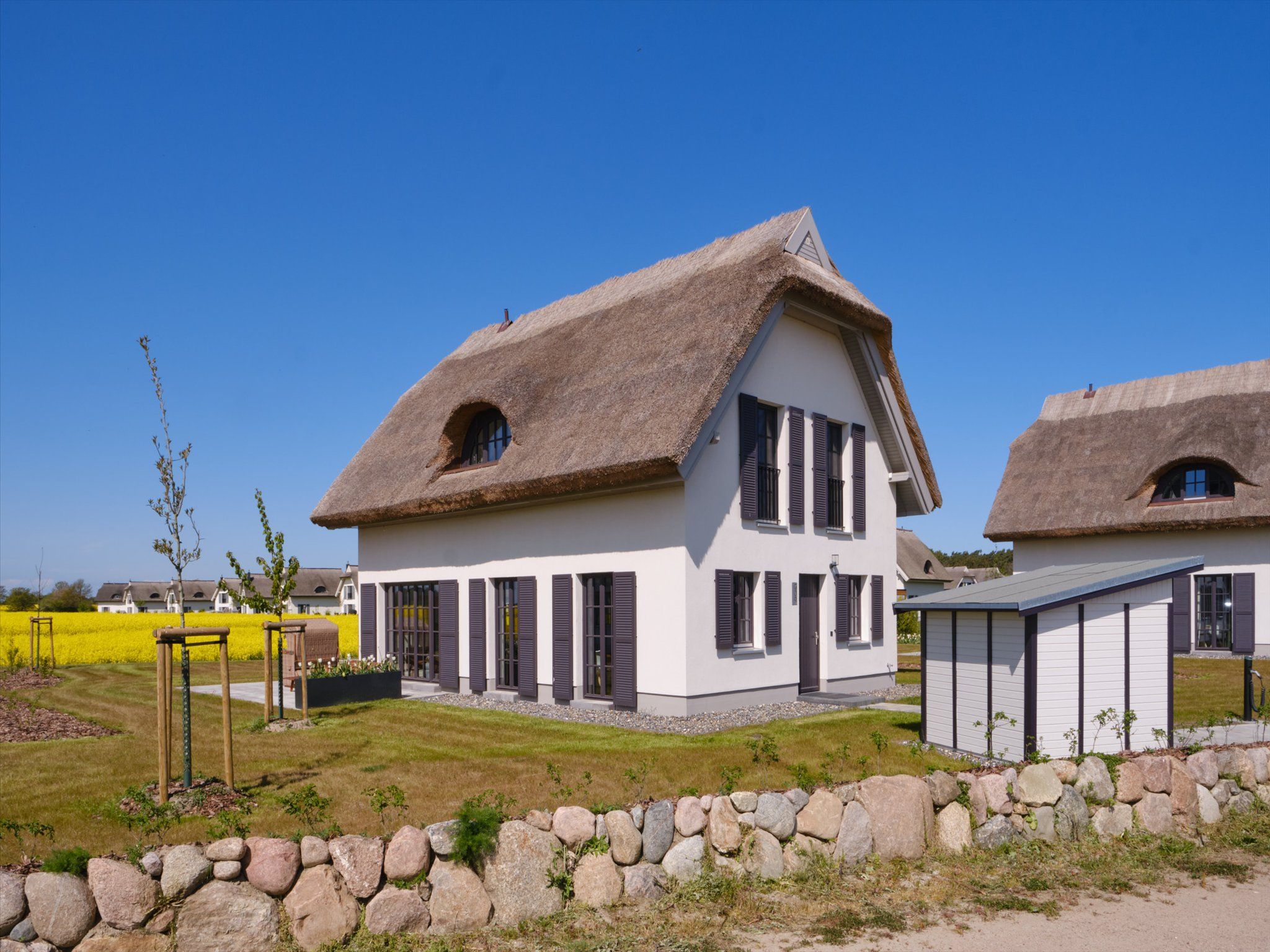 LuxusPlus Reetdachvilla mit 4 Schlafzimmern, Sauna und Kamin (G09) - Hauptansicht