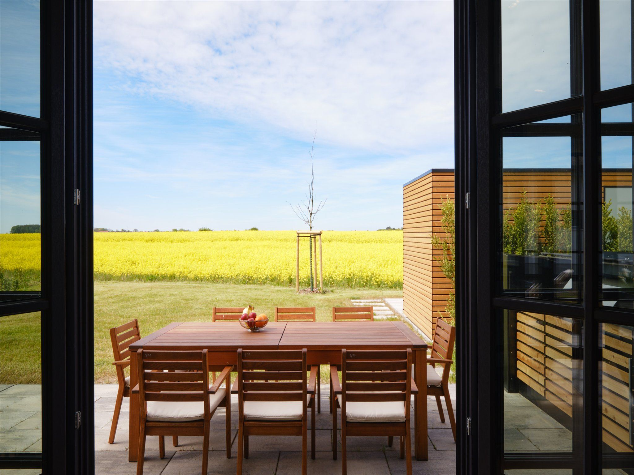 LuxusPlus Reetdachvilla mit 4 Schlafzimmern, Sauna und Kamin (G11) - Terrasse