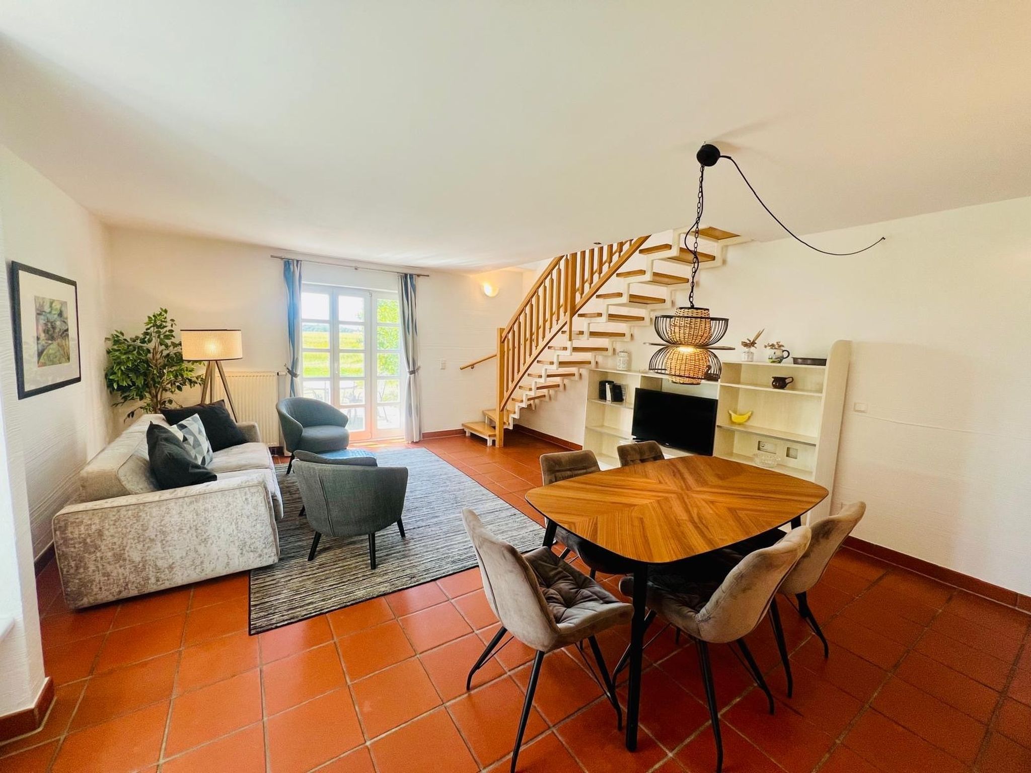 Feriendorf Rugana Komfort Ferienwohnung mit 2 Schlafzimmern und Terrasse (D19) Insel Rügen - Wohnzimmer