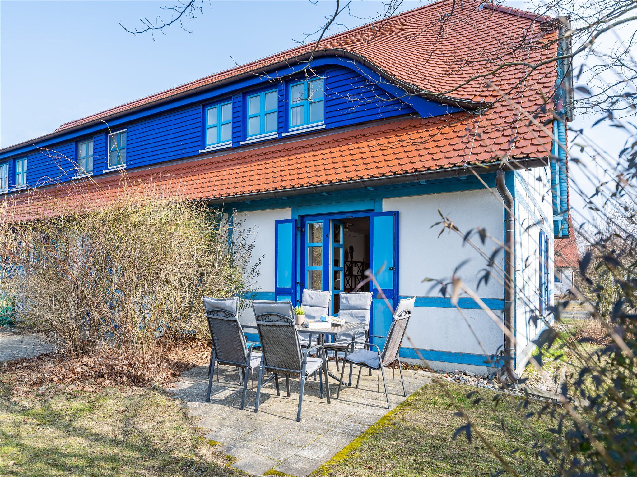 Feriendorf Rugana Komfortplus Ferienwohnung mit 2 Schlafzimmern und Terrasse (A64) Insel Rügen - Terrasse
