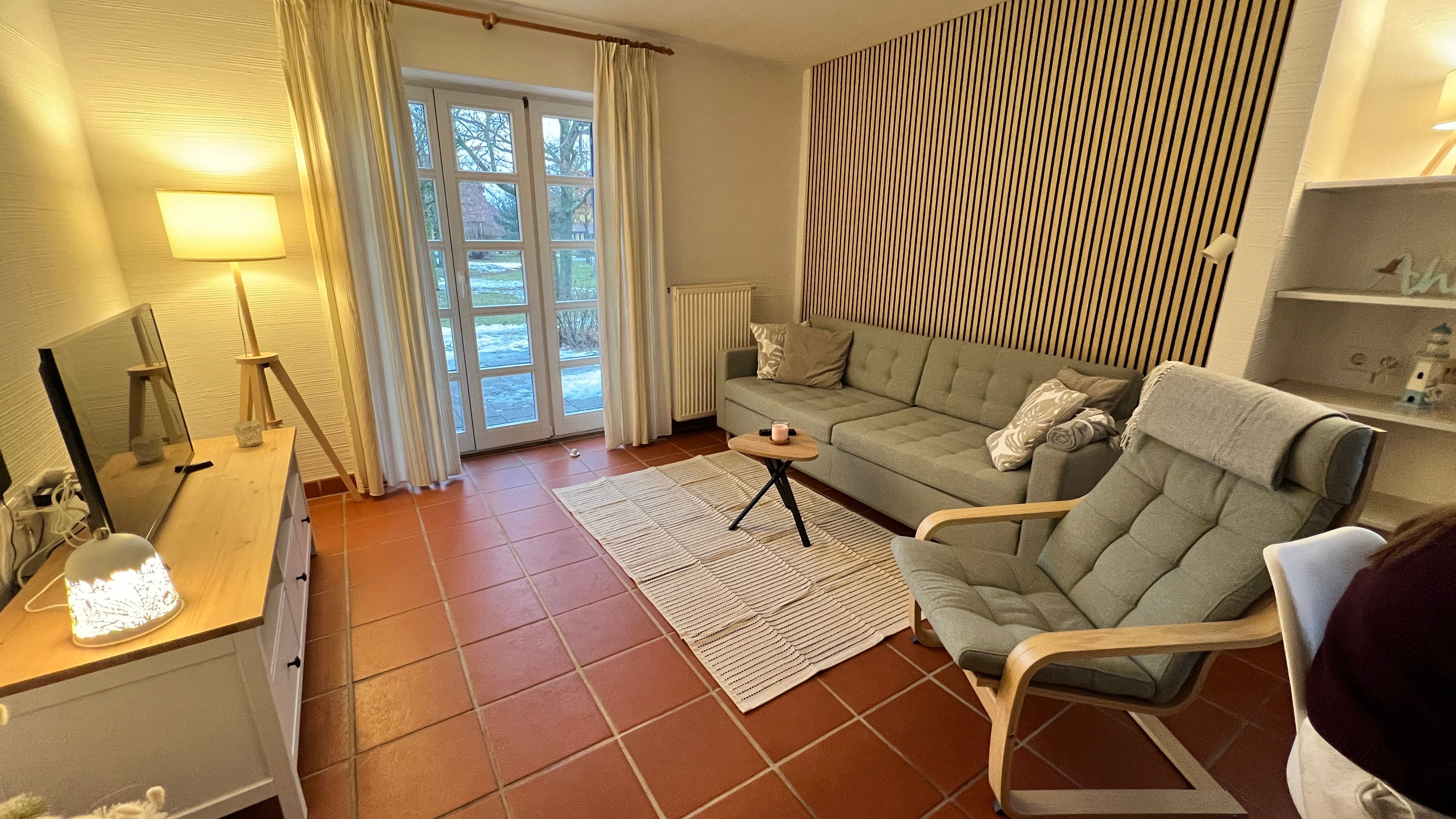 Feriendorf Rugana Klassik Ferienwohnung mit 1 Schlafzimmer und Terrasse (A33) Insel Rügen - Wohnzimmer