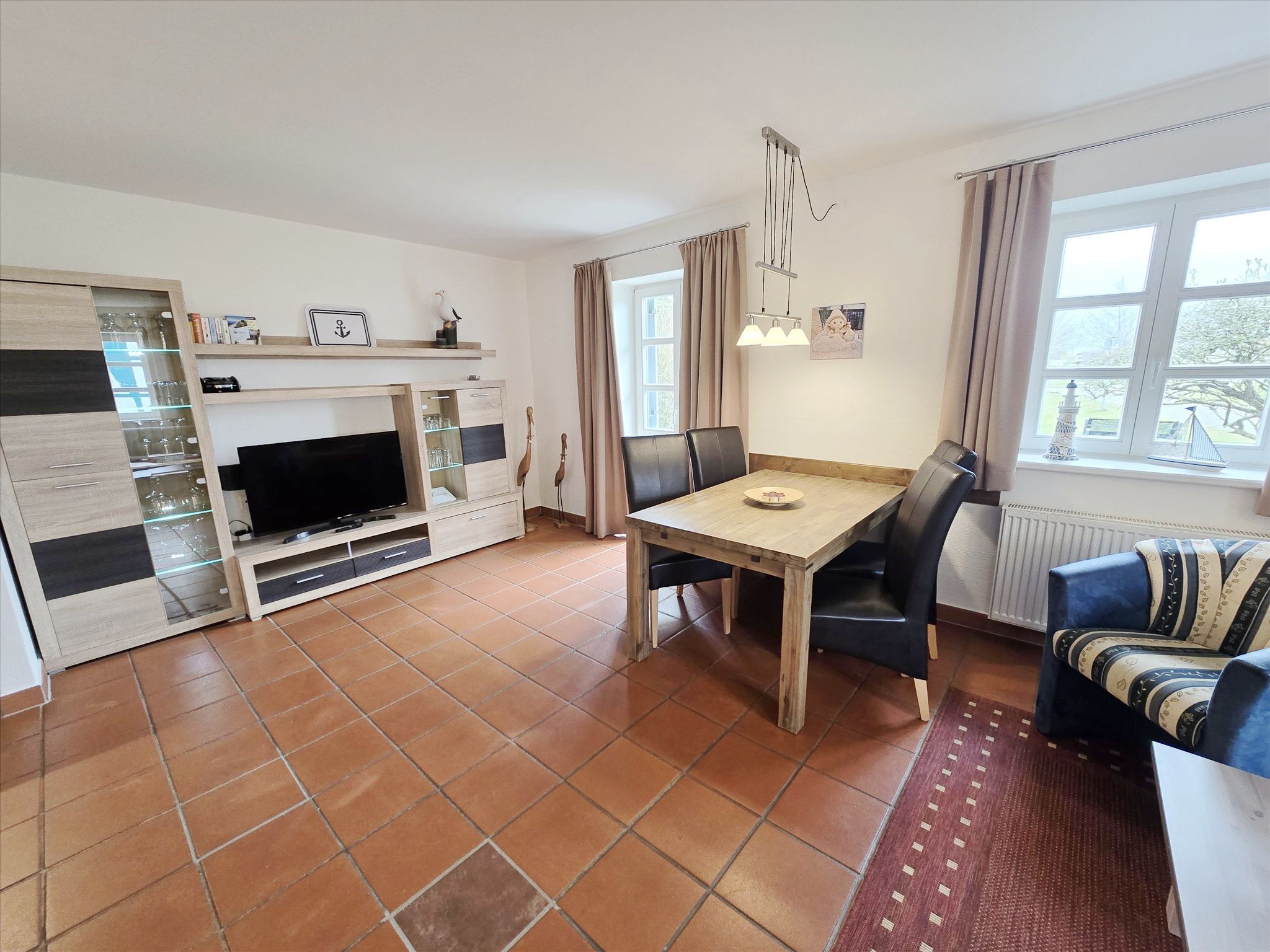 Feriendorf Rugana Komfortplus Ferienwohnung mit 1 Schlafzimmern und Terrasse Insel Rügen - Wohnzimmer